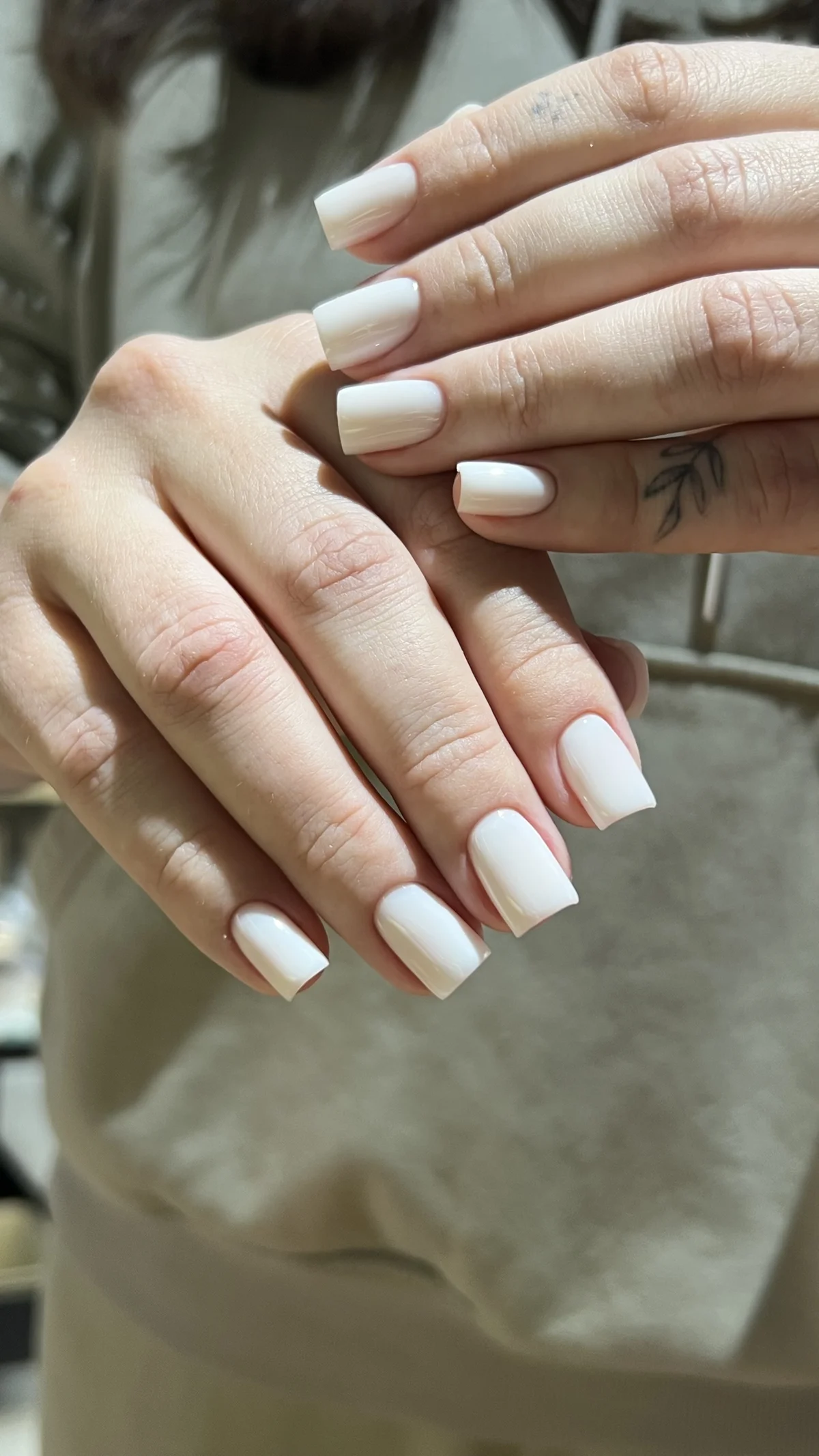 Milky white gel manicure, done at Norm